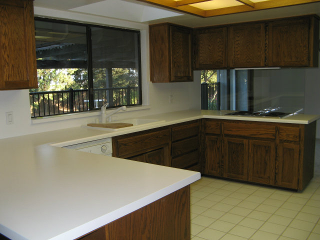 3360 Canada Road Gilroy, CA 95020 - Photo 7 of 23 a kitchen with a sink and cabinets