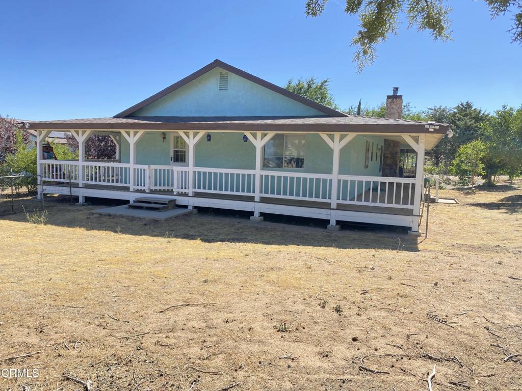 18300 Grant Place Tehachapi, CA 93561 - Photo 18 of 28 a view of a house with a yard