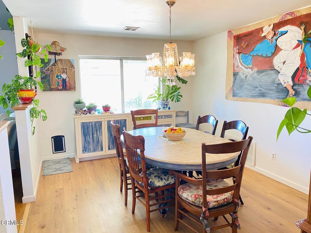 18300 Grant Place Tehachapi, CA 93561 - Photo 7 of 28 a view of a dining room with furniture and chandelier