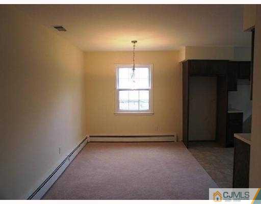 2 Rachele Court Old Bridge, NJ 07747 - Photo 5 of 5 en empty room with windows