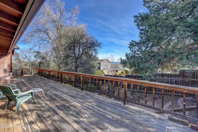 an aerial view of a house with a mountain view