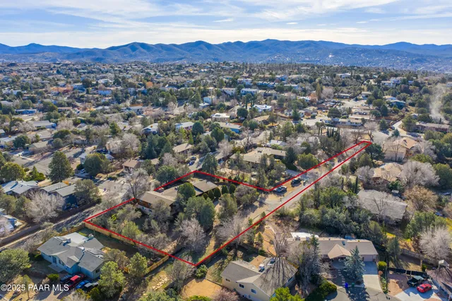 an aerial view of a city with lots of residential buildings