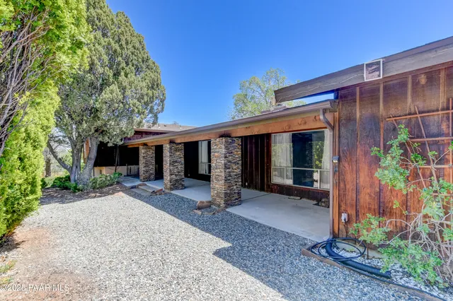 front view of a house with a patio