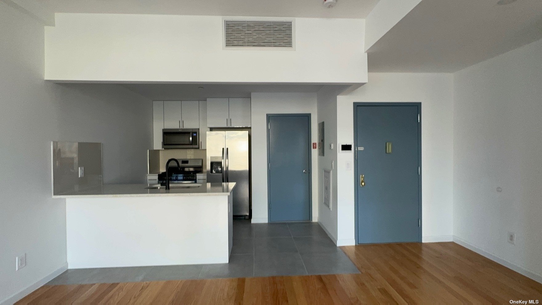 1821 Grove Street Queens, NY 11385 - Photo 14 of 30 a view of a kitchen from the hallway