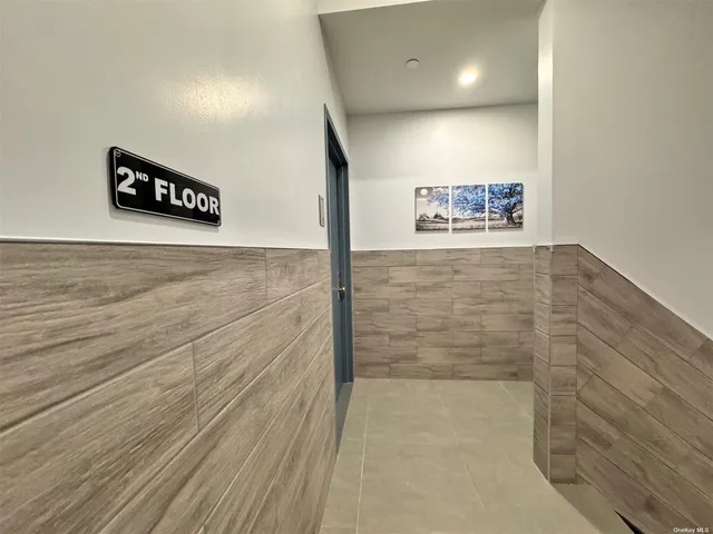 a bathroom with a toilet a sink and shower