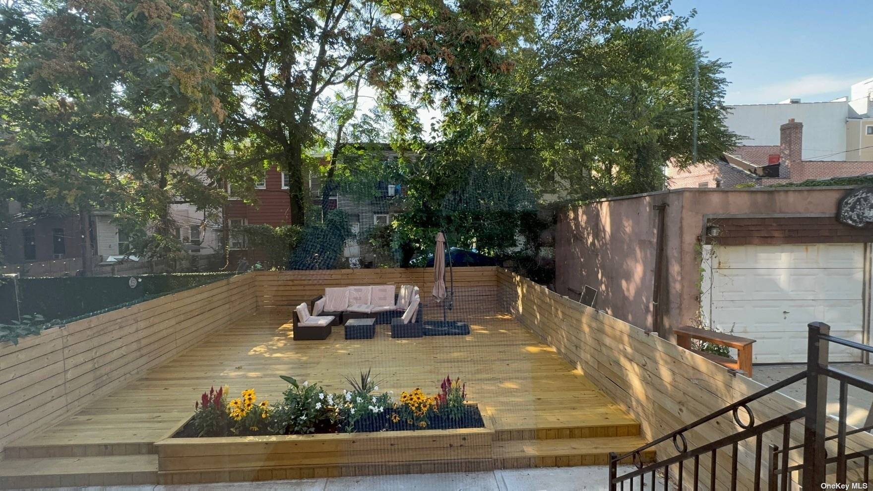 1821 Grove Street Queens, NY 11385 - Photo 7 of 30 a view of a swimming pool with a patio