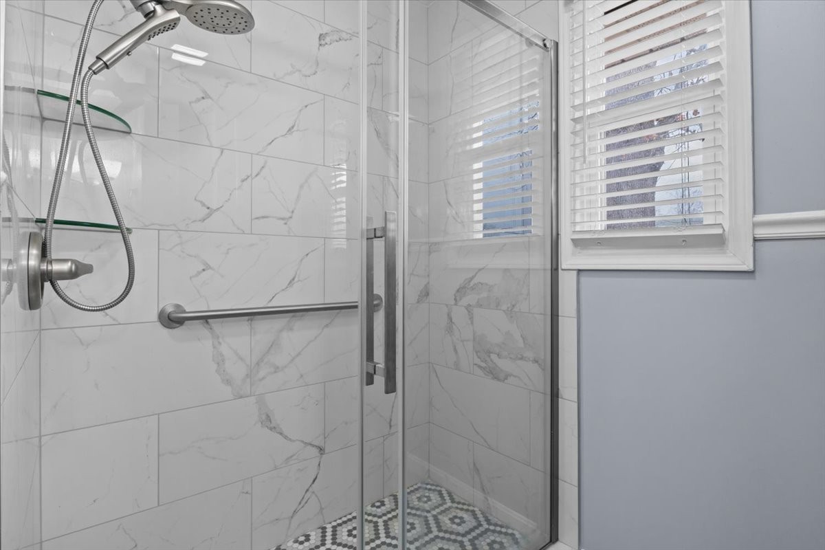 140 Mockingbird Street Erin, TN 37061 - Photo 18 of 36 a bathroom with a shower