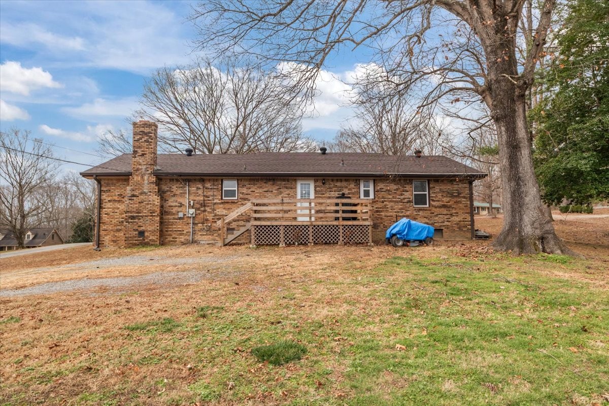 140 Mockingbird Street Erin, TN 37061 - Photo 36 of 36 a front view of a house with garden
