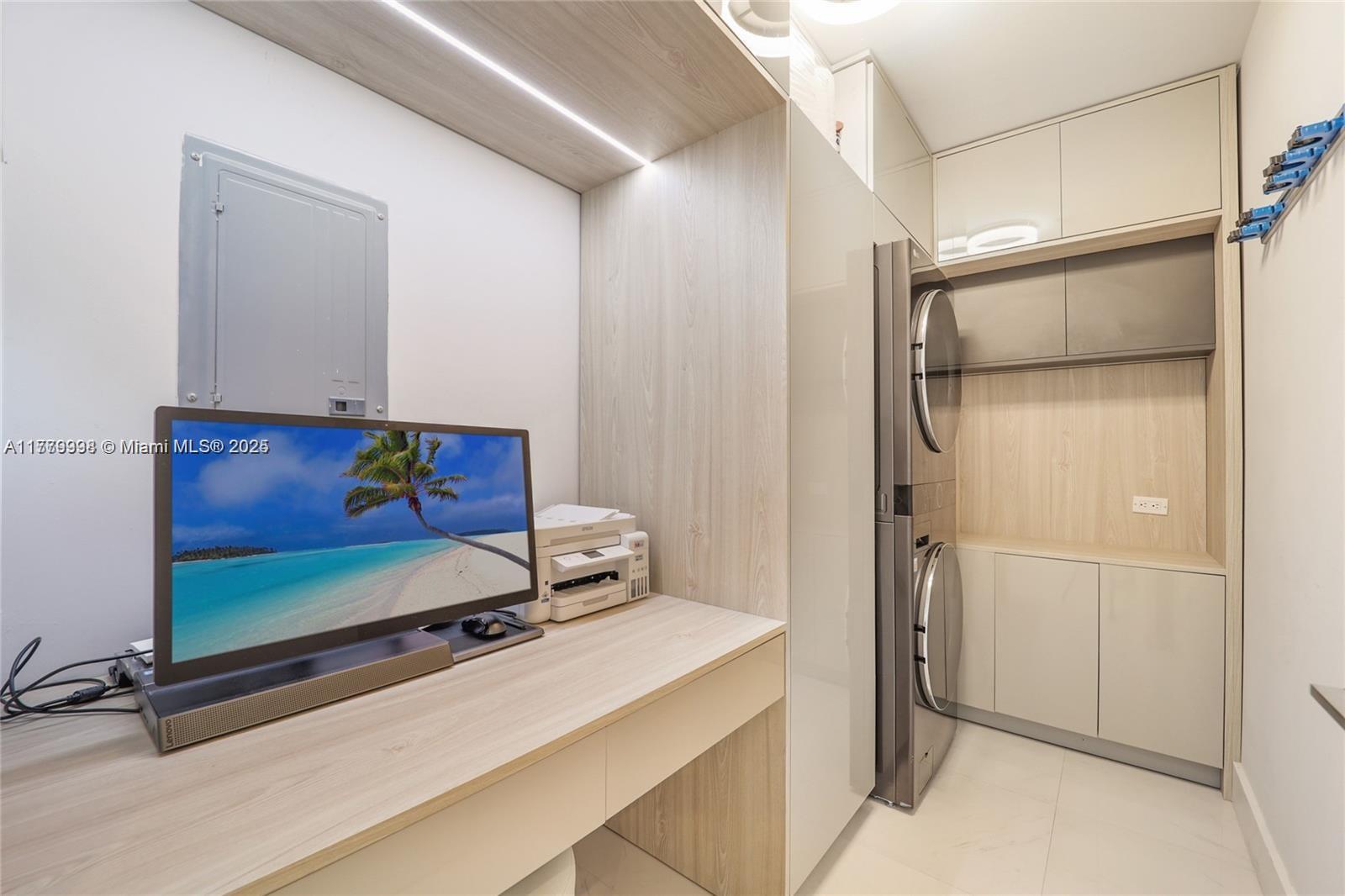 1100 Biscayne Boulevard, Unit 3004 Miami, FL 33132 - Photo 12 of 15 a room with gym equipment and a table