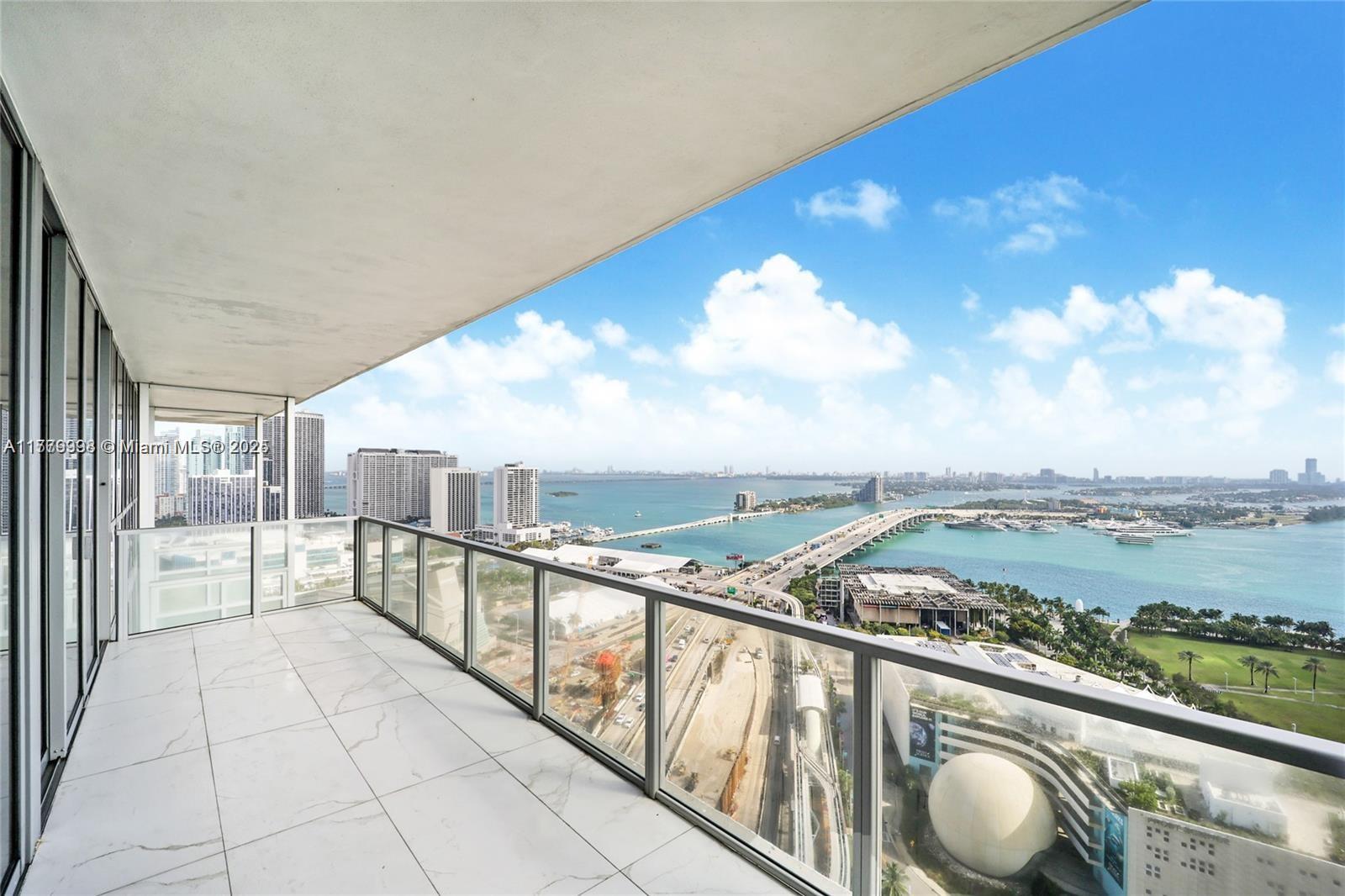 1100 Biscayne Boulevard, Unit 3004 Miami, FL 33132 - Photo 14 of 15 a view of balcony with furniture
