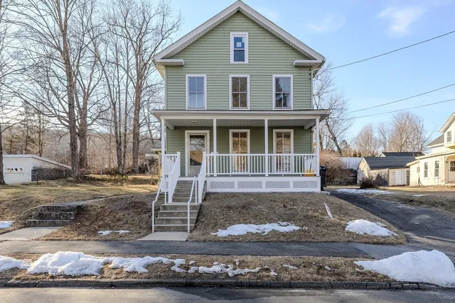 a front view of a house with porch