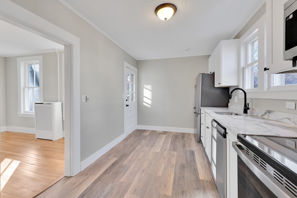 24 Flynt Avenue Monson, MA 01057 - Photo 18 of 29 a kitchen with a sink and wooden floor
