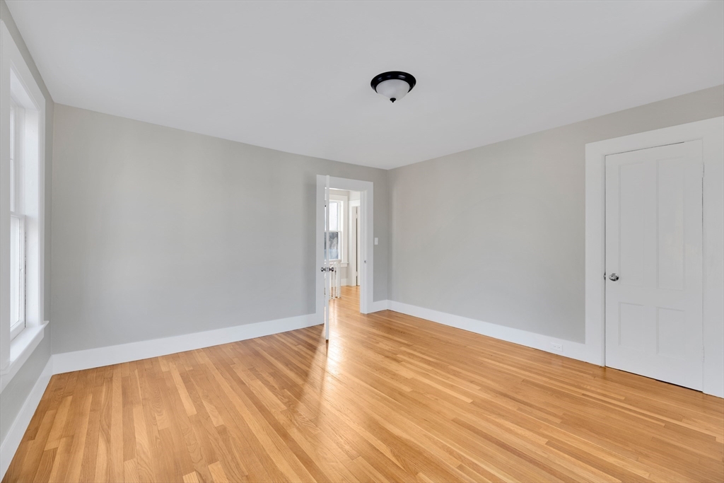 24 Flynt Avenue Monson, MA 01057 - Photo 21 of 29 a view of an empty room with wooden floor