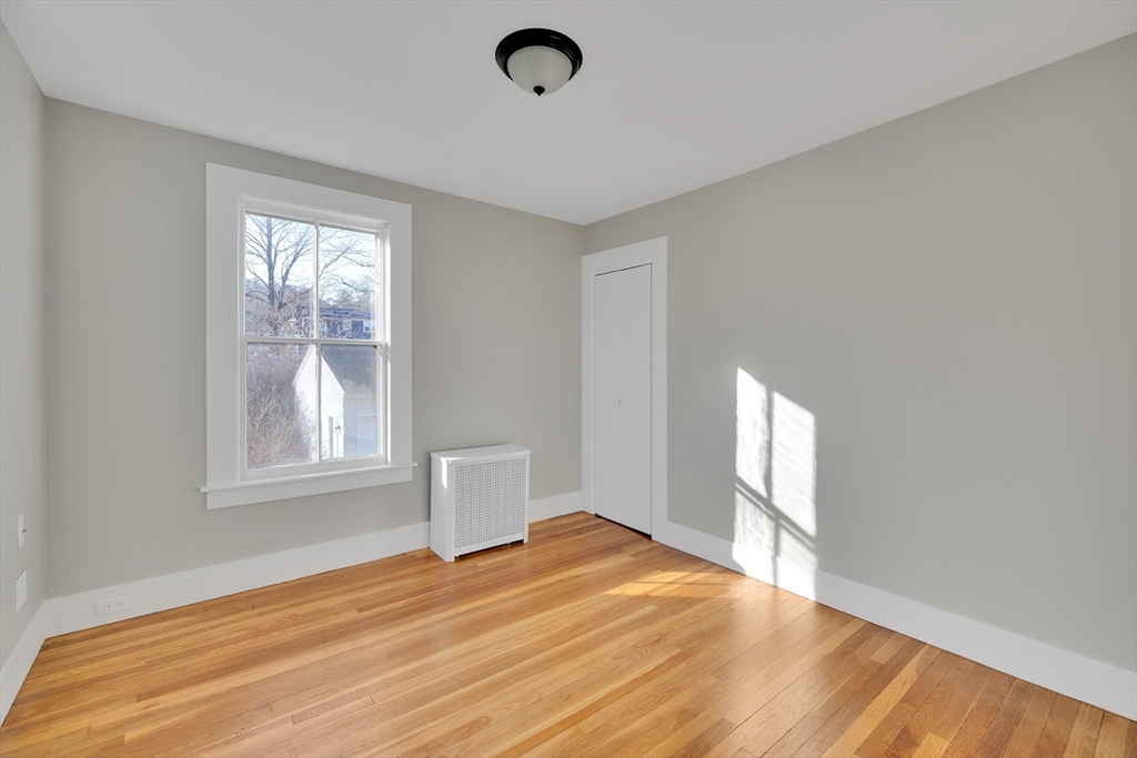 24 Flynt Avenue Monson, MA 01057 - Photo 22 of 29 a view of empty room with wooden floor and fan