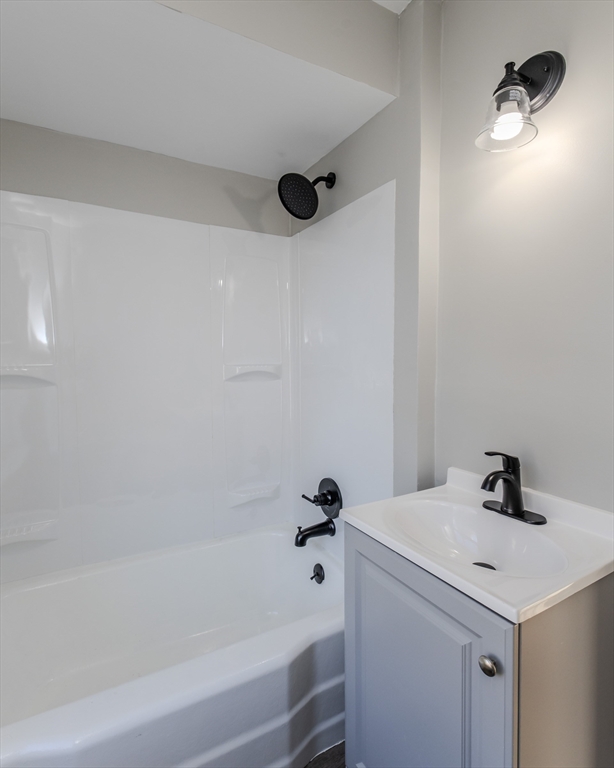 24 Flynt Avenue Monson, MA 01057 - Photo 27 of 29 a bathroom with a tub and sink