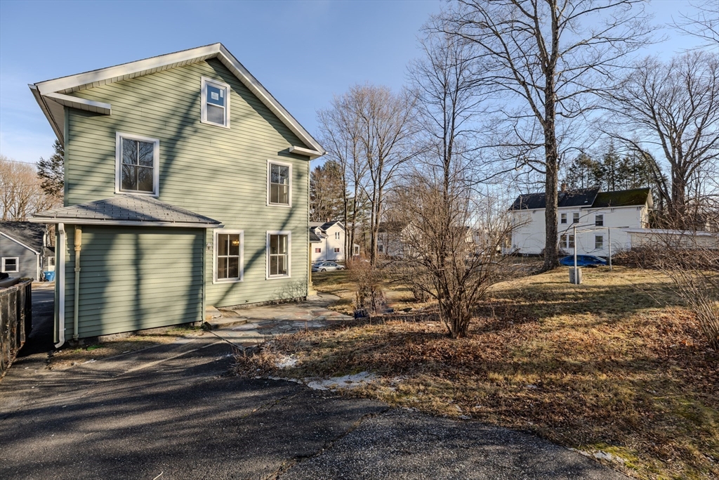 24 Flynt Avenue Monson, MA 01057 - Photo 6 of 29 a view of a house with a yard covered in snow