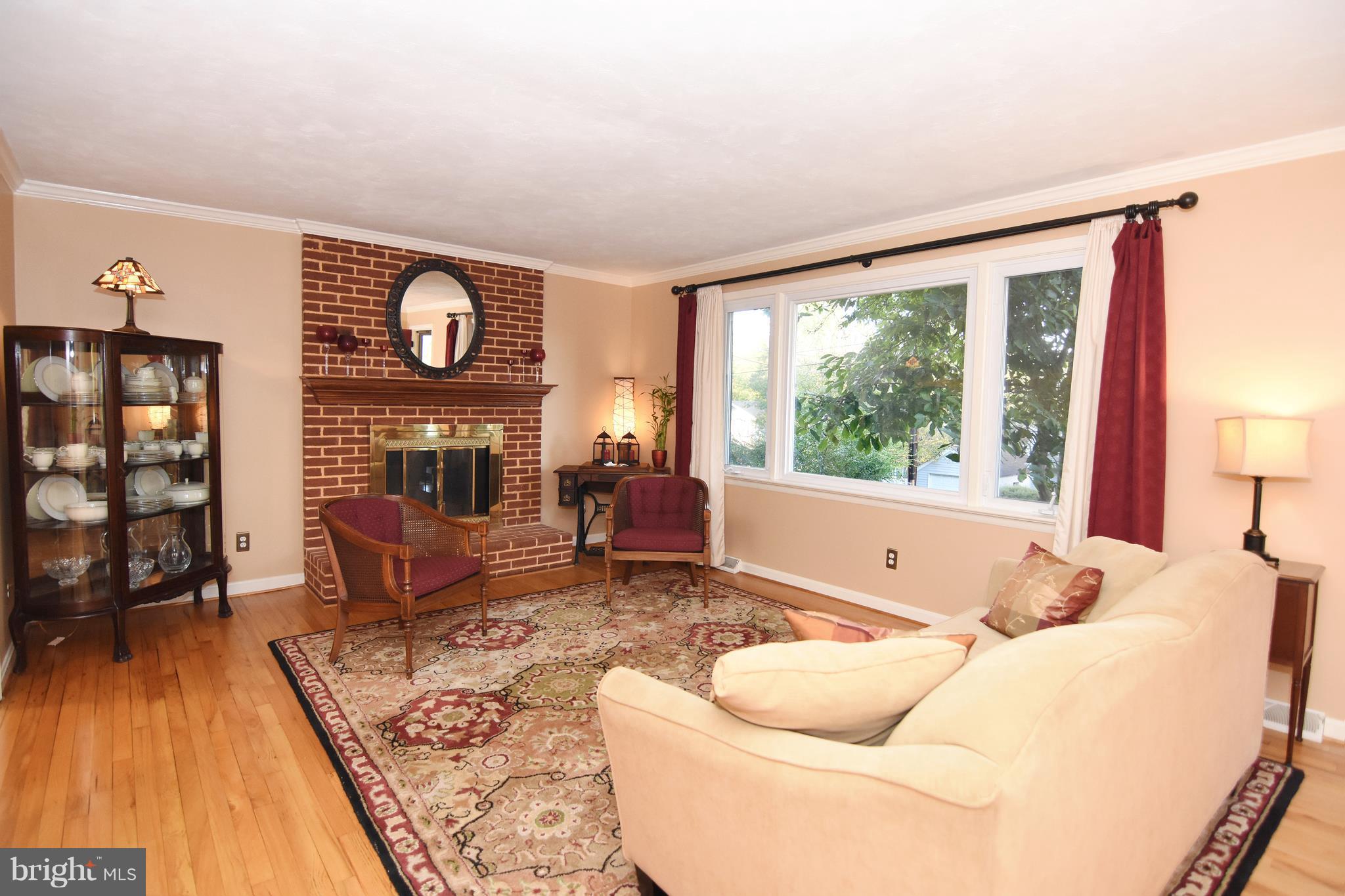 447 Walnut Drive Edgewater, MD 21037 - Photo 13 of 30 Living Room w/Brick Fireplce & Hardwood Floors