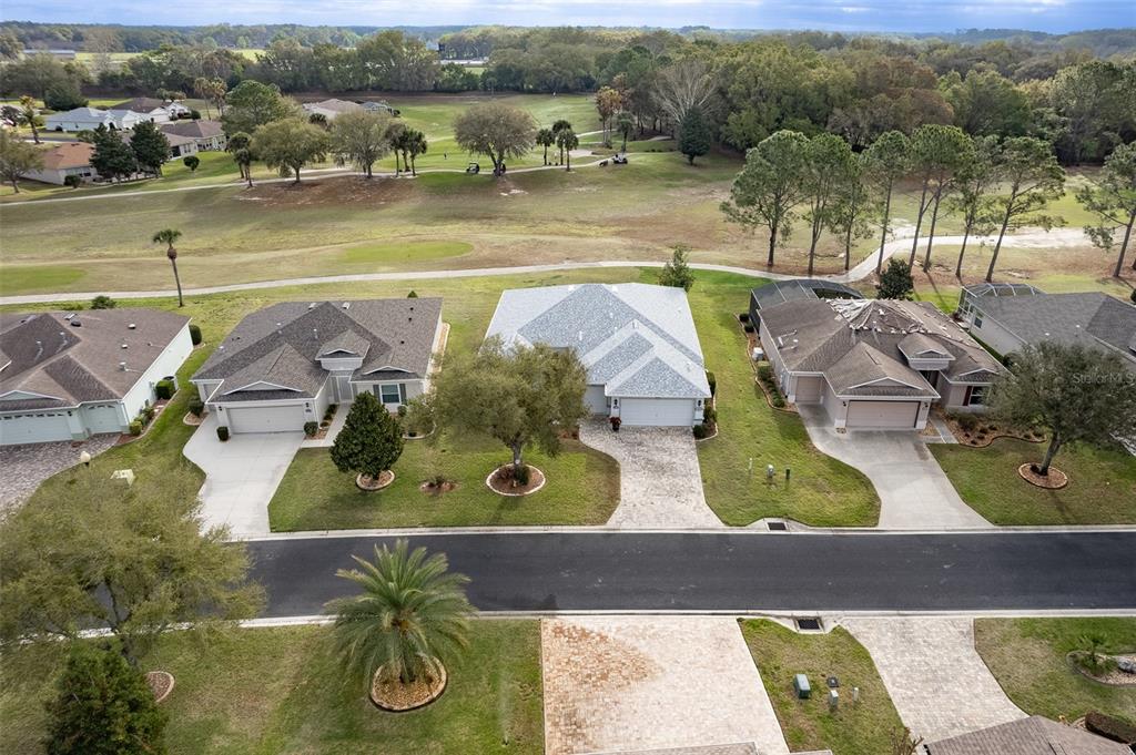 15969 Southwest 14th Avenue Road Ocala, FL 34473 - Photo 37 of 46 an aerial view of a house with outdoor space swimming pool and lake view