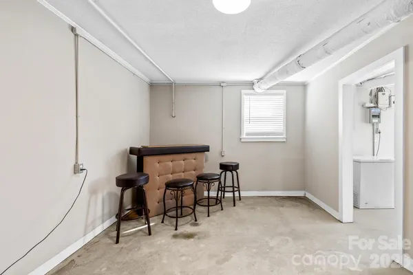 a room with furniture and a window