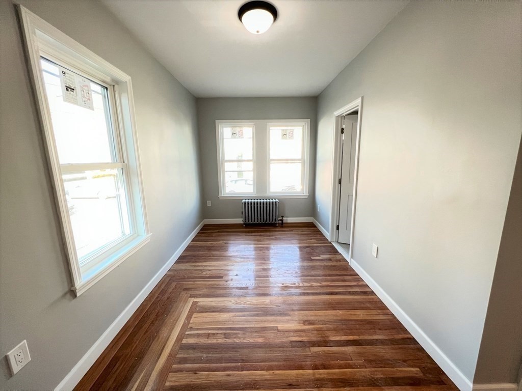 25 Teragram Street, Unit 1 Boston, MA 02128 - Photo 15 of 21 a view of entryway with wooden floor