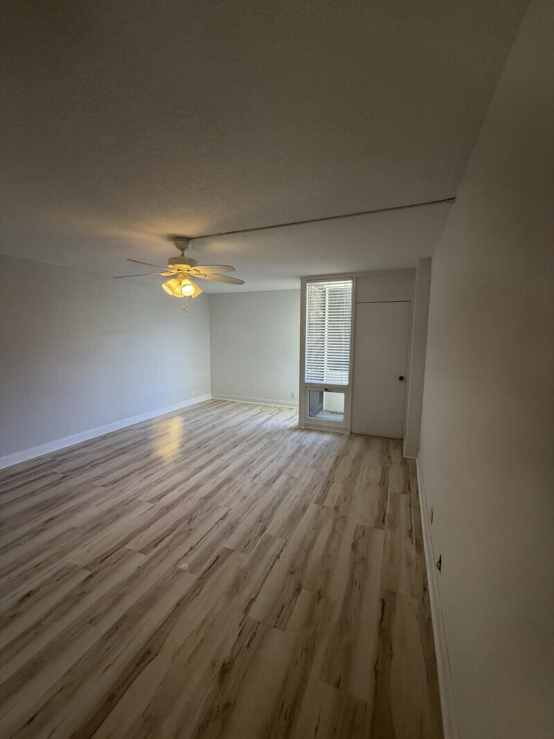 1401 South Federal Highway, Unit 102 Boca Raton, FL 33432 - Photo 18 of 38 a view of empty room with wooden floor