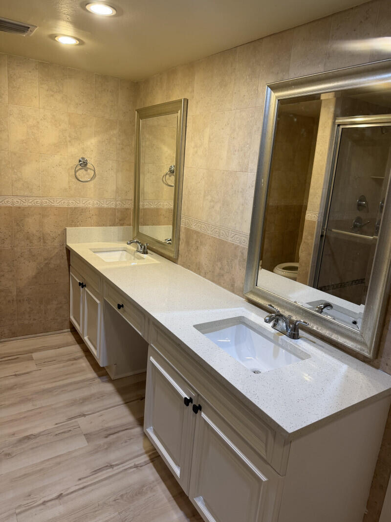 1401 South Federal Highway, Unit 102 Boca Raton, FL 33432 - Photo 31 of 38 a bathroom with a sink and a mirror