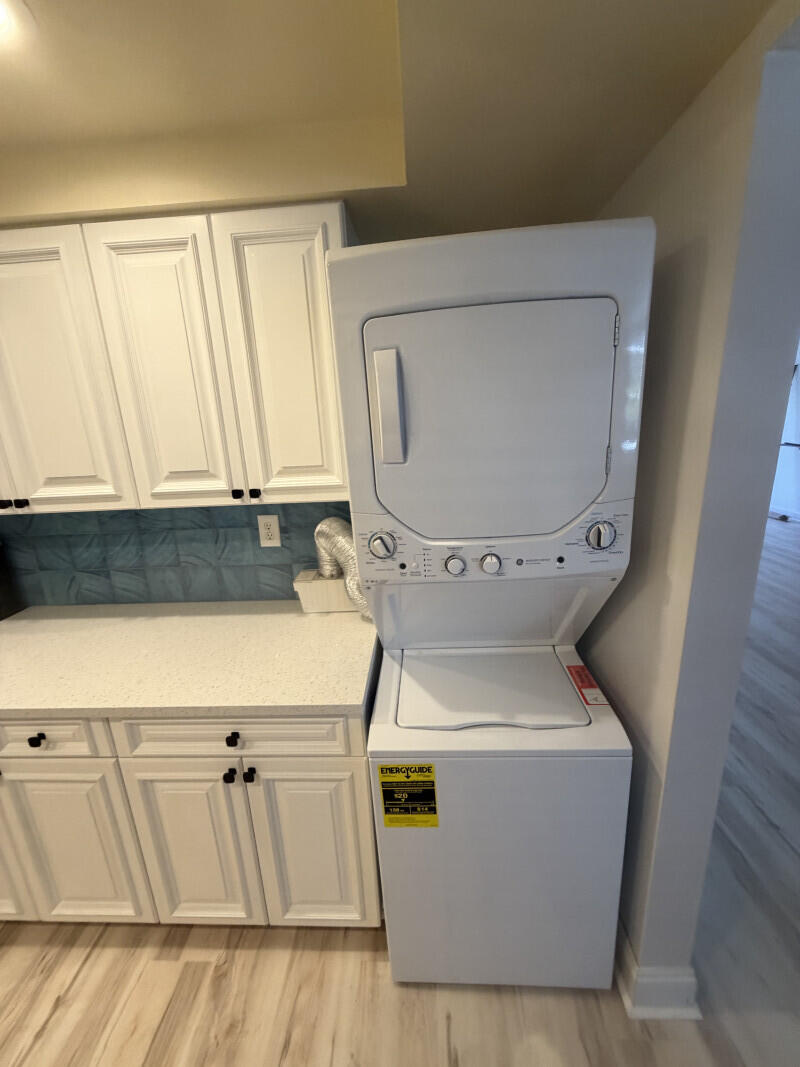 1401 South Federal Highway, Unit 102 Boca Raton, FL 33432 - Photo 6 of 38 a utility room with dryer and washer