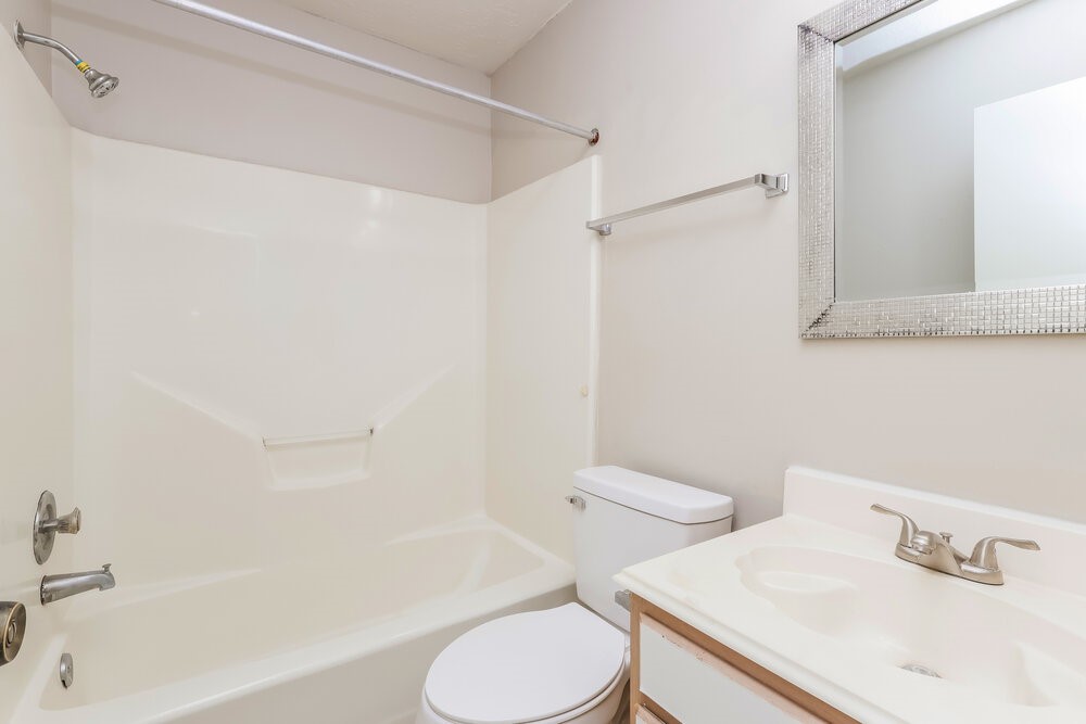 28907 Binefield Street Spring, TX 77386 - Photo 15 of 16 a white toilet sitting next to a bath tub