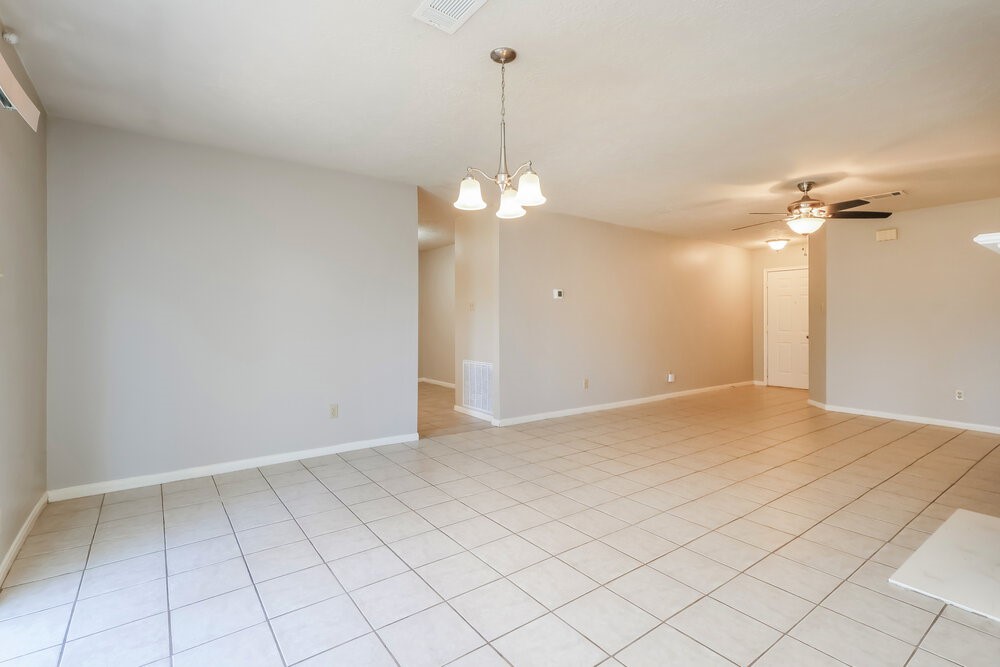 28907 Binefield Street Spring, TX 77386 - Photo 6 of 16 a view of an empty room and chandelier fan
