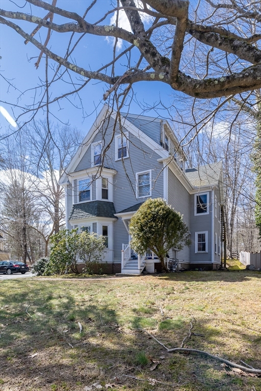 956 Bay Road, Unit 3 Hamilton, MA 01982 - Photo 3 of 30 a view of a house with a yard