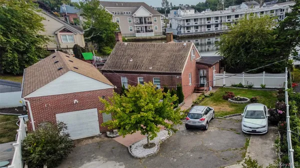 an aerial view of a house with patio