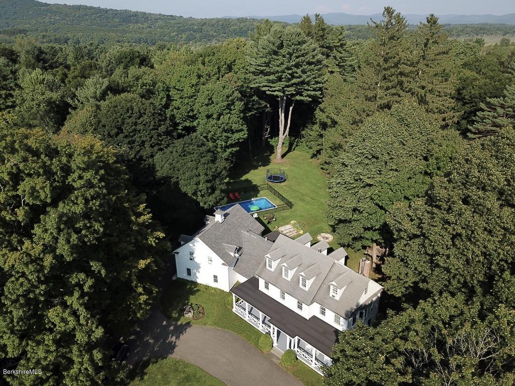 12 Prospect Hill Road Stockbridge, MA 01262 - Photo 1 of 30 an aerial view of a house with a yard