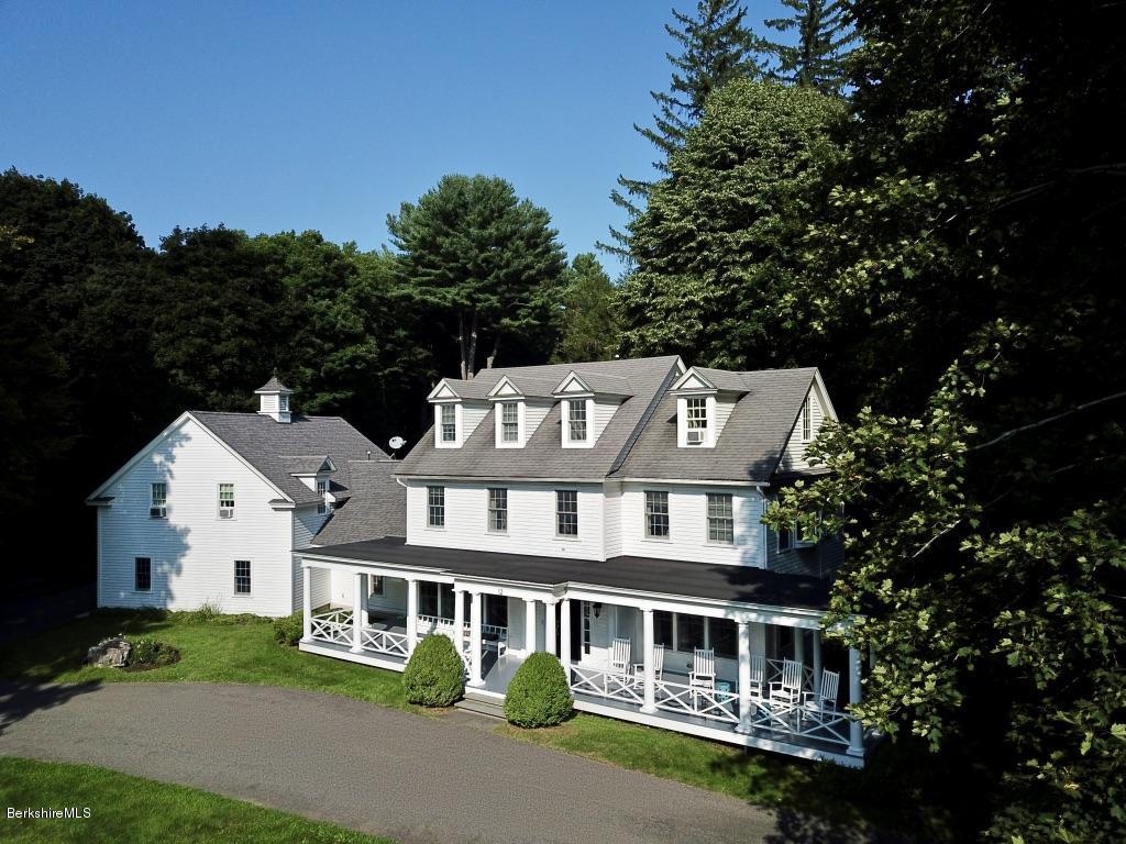 12 Prospect Hill Road Stockbridge, MA 01262 - Photo 2 of 30 a front view of a house with a yard