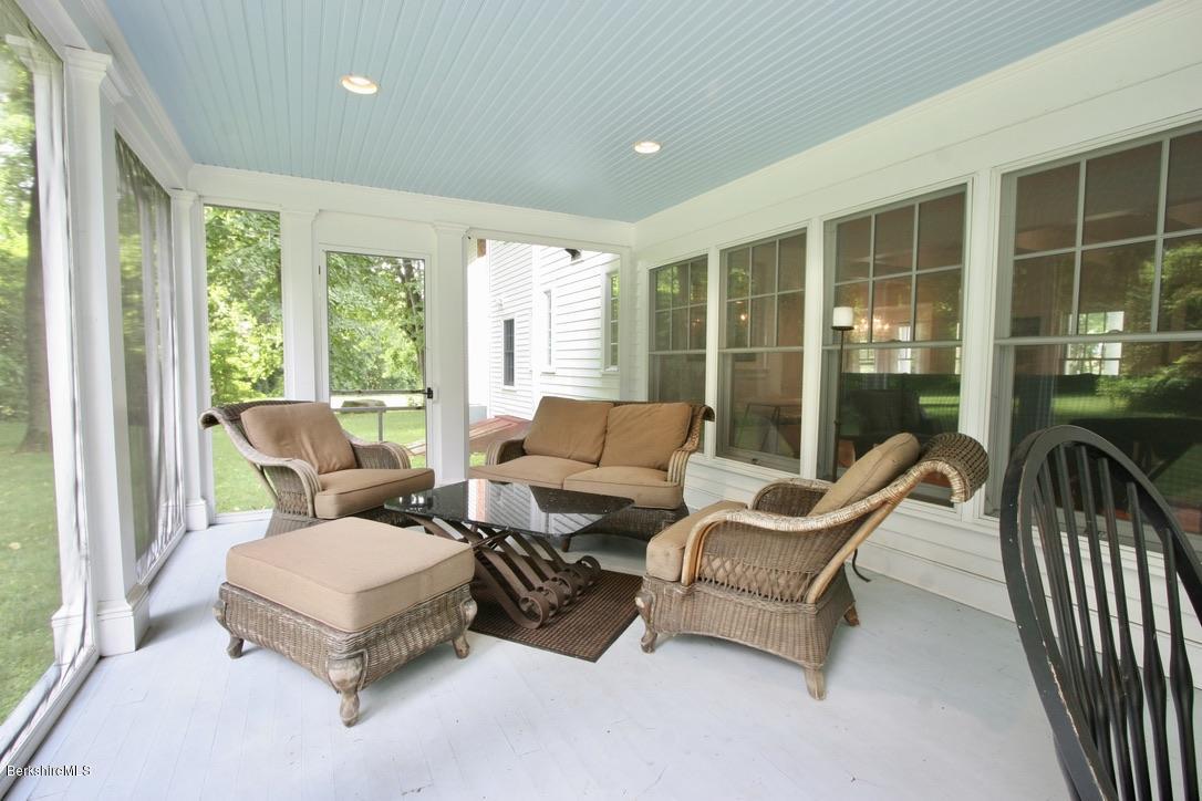 12 Prospect Hill Road Stockbridge, MA 01262 - Photo 17 of 30 a living room with furniture and large windows