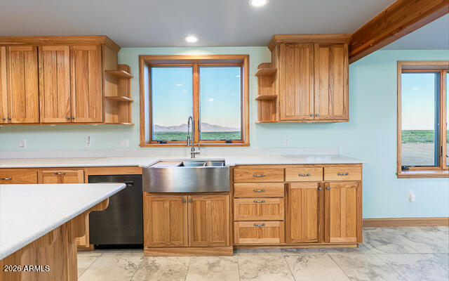 6233 West Airport Road Willcox, AZ 85643 - Photo 20 of 54 a kitchen with stainless steel appliances granite countertop a sink and a cabinets