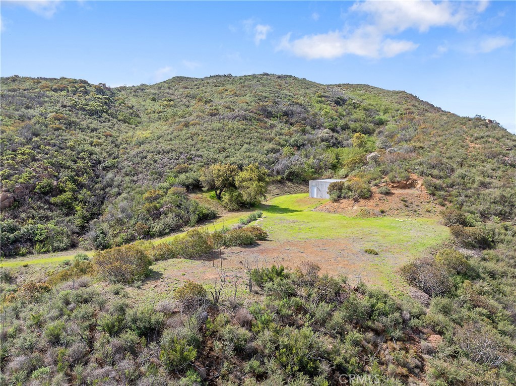 10120 Yerba Buena Road Malibu, CA 90265 - Photo 38 of 40 a view of a lake with a mountain in the background