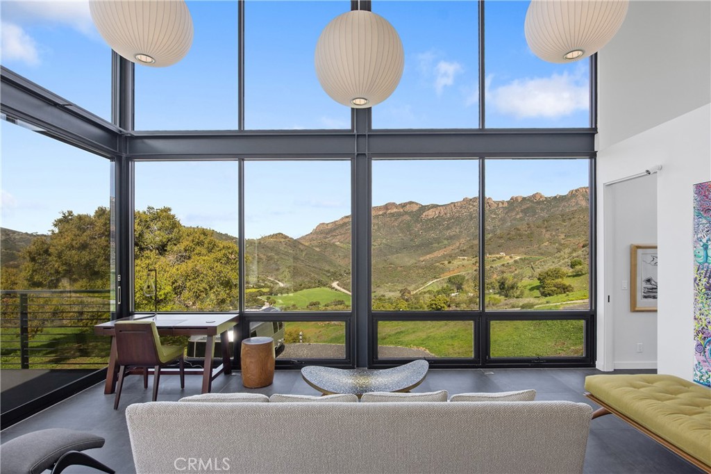 10120 Yerba Buena Road Malibu, CA 90265 - Photo 7 of 40 a living room with couches