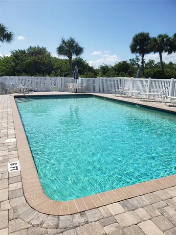 a view of a terrace with seating space
