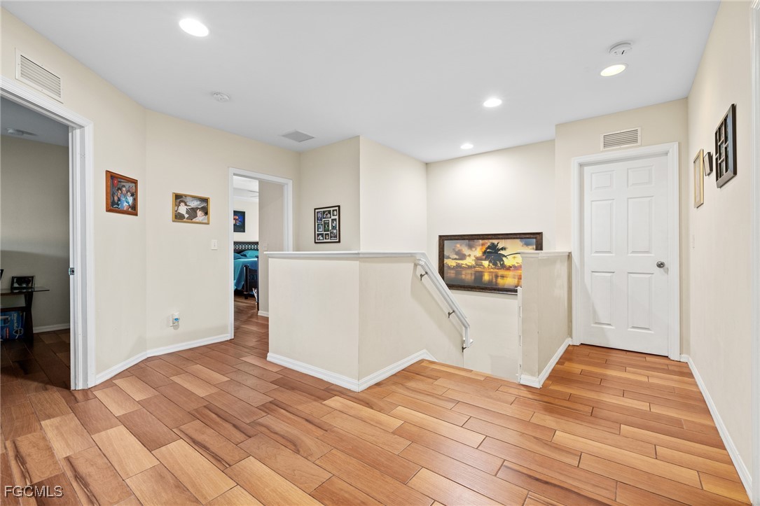 8657 Sumner Avenue Fort Myers, FL 33908 - Photo 14 of 29 a view of empty room with wooden floor