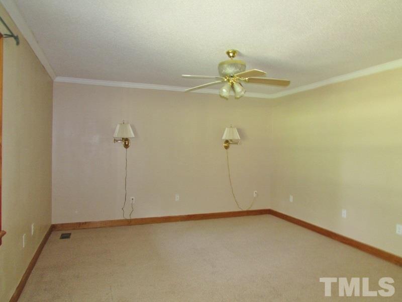 558 Robert Gentry Road Timberlake, NC 27583 - Photo 10 of 25 Master Bedroom has been freshly painted and new carpet