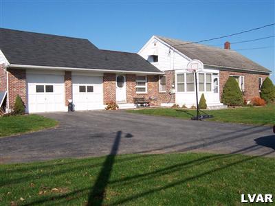 529 Jacobsburg Road Nazareth, PA 18064 - Photo 1 of 9 a front view of a house with a yard