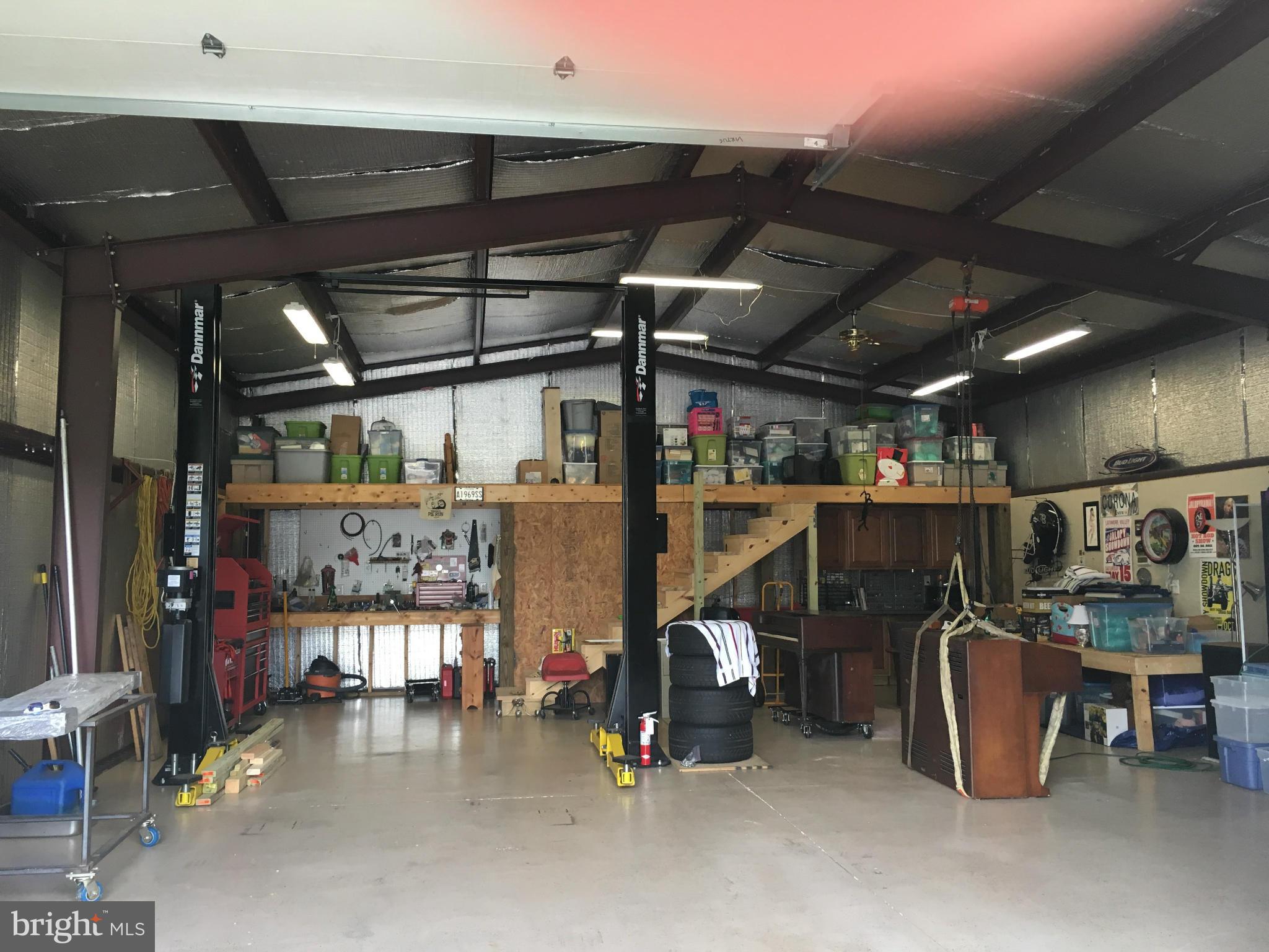 8107 Hog Neck Road Pasadena, MD 21122 - Photo 3 of 27 a view of storage and utility room