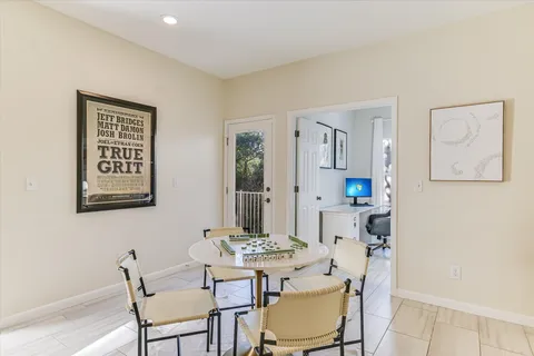 a view of a dining room with furniture