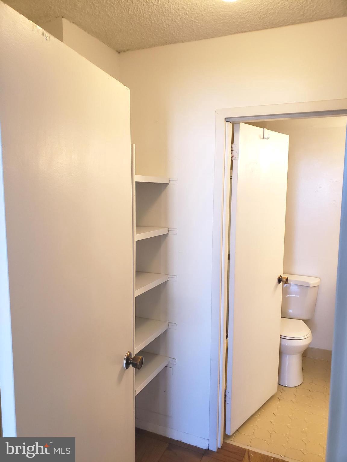 5225 Pooks Hill Road, Unit 1014S Bethesda, MD 20814 - Photo 7 of 14 Walk-through to bathroom