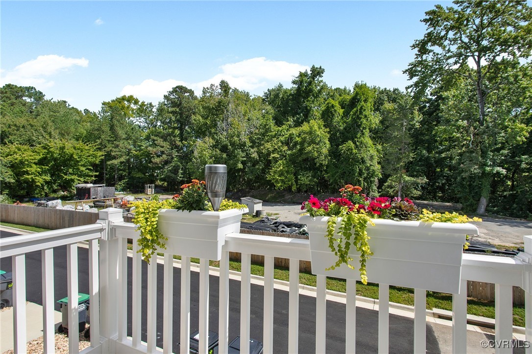 1321 Ewing Pk Loop Midlothian, VA 23113 - Photo 20 of 30 a view of a table and chairs in the roof deck