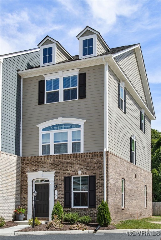1321 Ewing Pk Loop Midlothian, VA 23113 - Photo 2 of 30 a front view of a house with yard