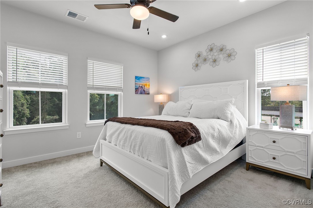 1321 Ewing Pk Loop Midlothian, VA 23113 - Photo 22 of 30 a spacious bedroom with a large bed and a window