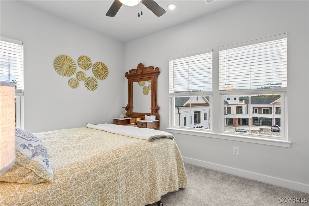 1321 Ewing Pk Loop Midlothian, VA 23113 - Photo 26 of 30 a bedroom with a bed and a large window