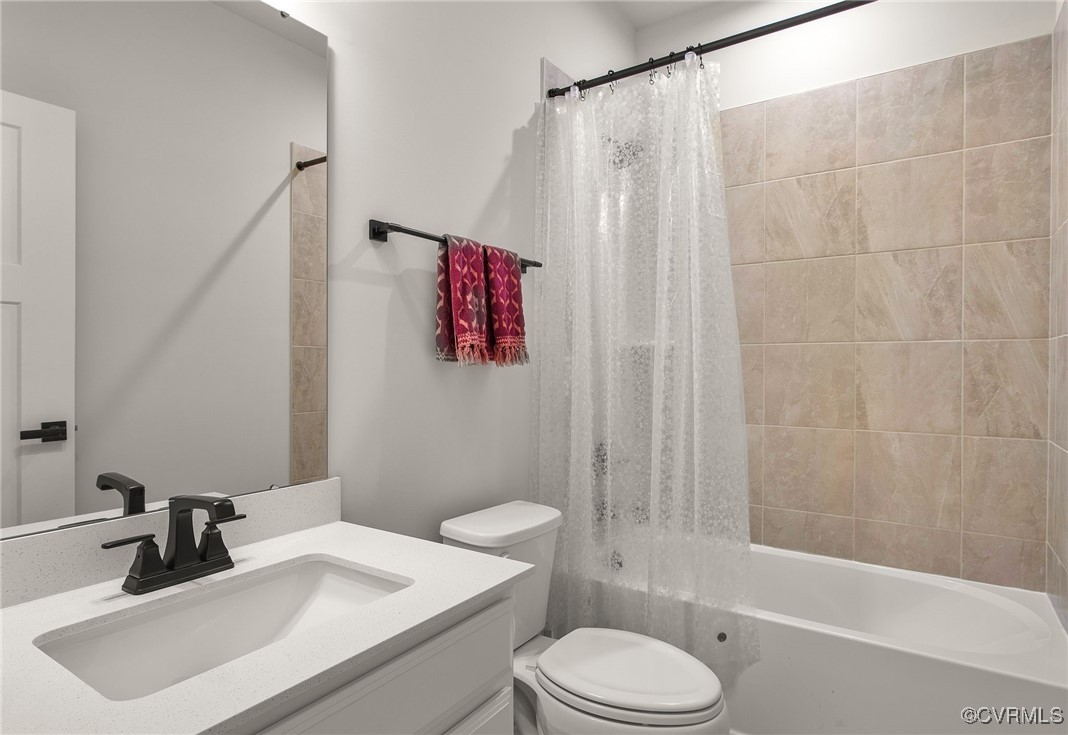 1321 Ewing Pk Loop Midlothian, VA 23113 - Photo 28 of 30 a bathroom with a sink toilet and shower