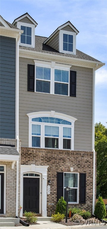 1321 Ewing Pk Loop Midlothian, VA 23113 - Photo 3 of 30 a front view of a house with a yard
